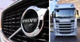 Bonusar på Volvo Cars och Scania. Volvos logga och lastbil från Scania.